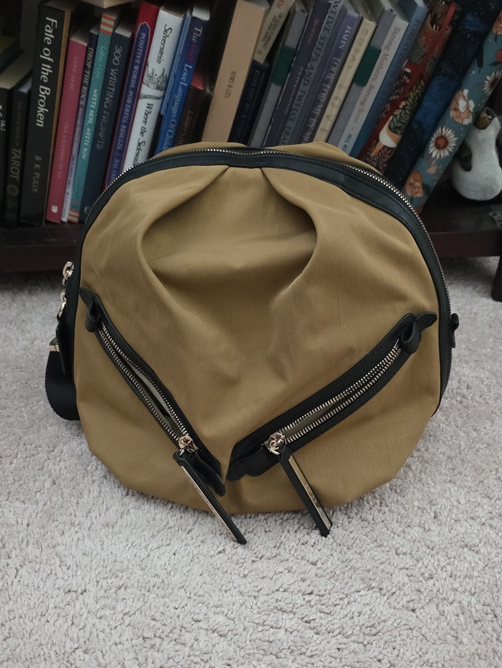 caraa Round Backpack in Tan with Black Trim